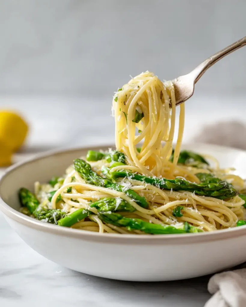 asparagus and pasta with garlic lemon sauce and parmesan