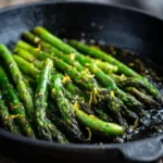 blistered asparagus with charred edges and olive oil