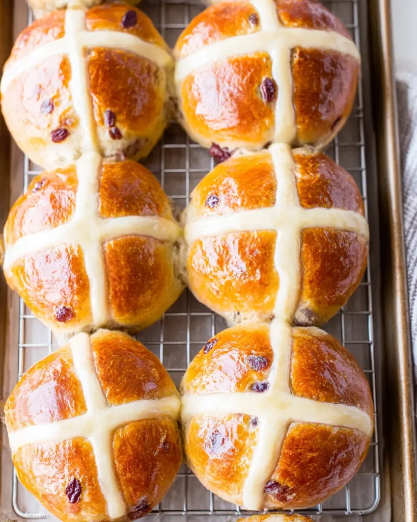 traditional hot cross buns with white crosses and glossy golden tops