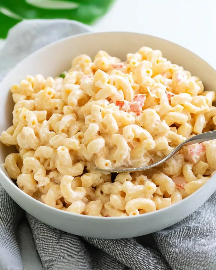 Hawaiian macaroni salad served in a bowl with creamy dressing and elbow macaroni