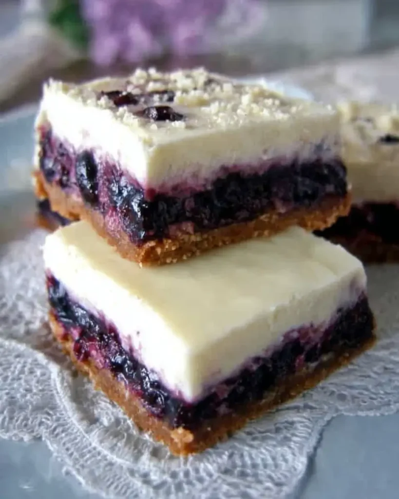 No-Bake Blueberry Cheesecake Bars with creamy filling and blueberry topping
